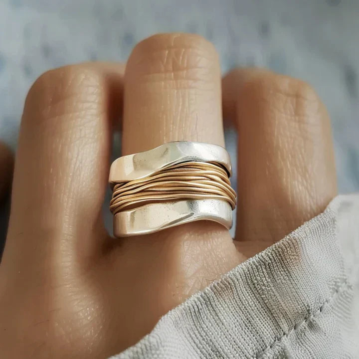 Silver Ring Adorned with Delicate Gold Threads