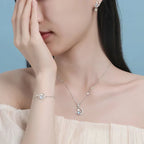 Zirconia-Studded Sterling Silver Earrings Featuring Cat, Moon, and Star Design