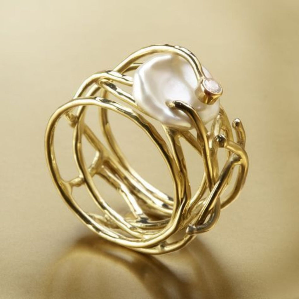 Delicate Gold Band Adorned with Pearls
